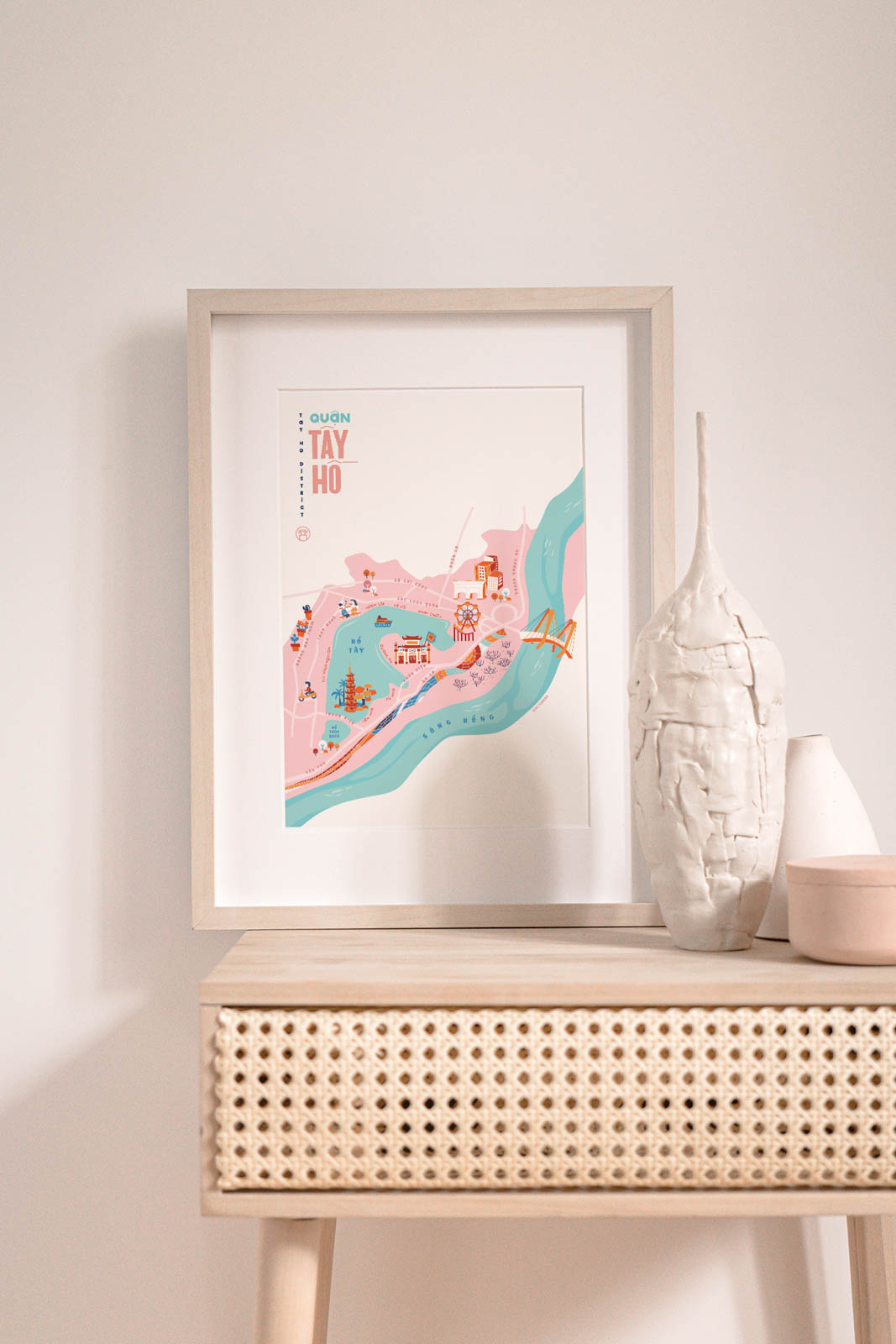 Tay Ho District Illustrated Map portrays iconic landmarks around Tay Ho: Ciputra Hanoi, Ho Tay Water Park, West Lake, Tran Quoc Pagoda, Truc Bach Lake, Quan Thanh Temple, Phu Tay Ho, Hanoi Ceramic Mosaic Mural, Quang Ba Flower Market